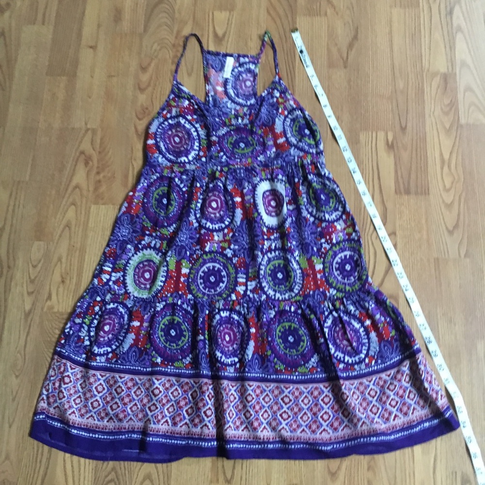 Cute Boho tiered mini dress with razorback.